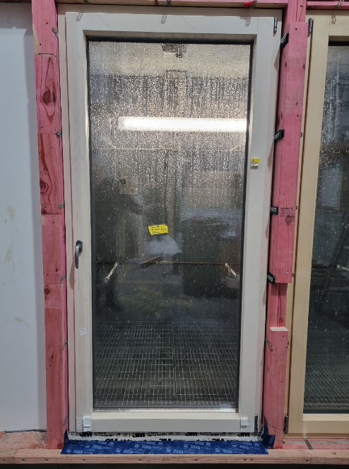 Eco Plano balcony door installed in water test booth
